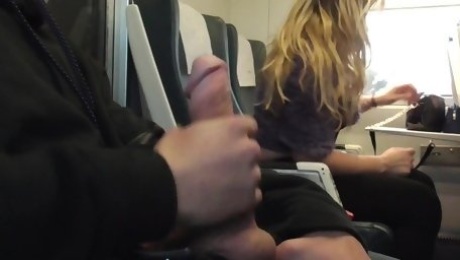 Curly blonde girl sucks stranger's dick in the train